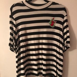 Striped top with rose embellishment